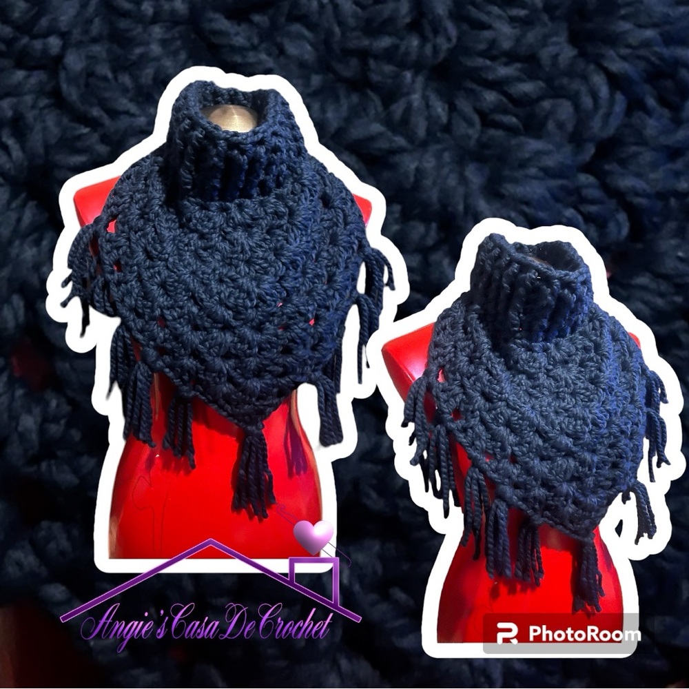 Crochet cowl with tassel.